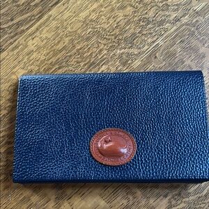 Dooney and Bourke clutch with wallet inside